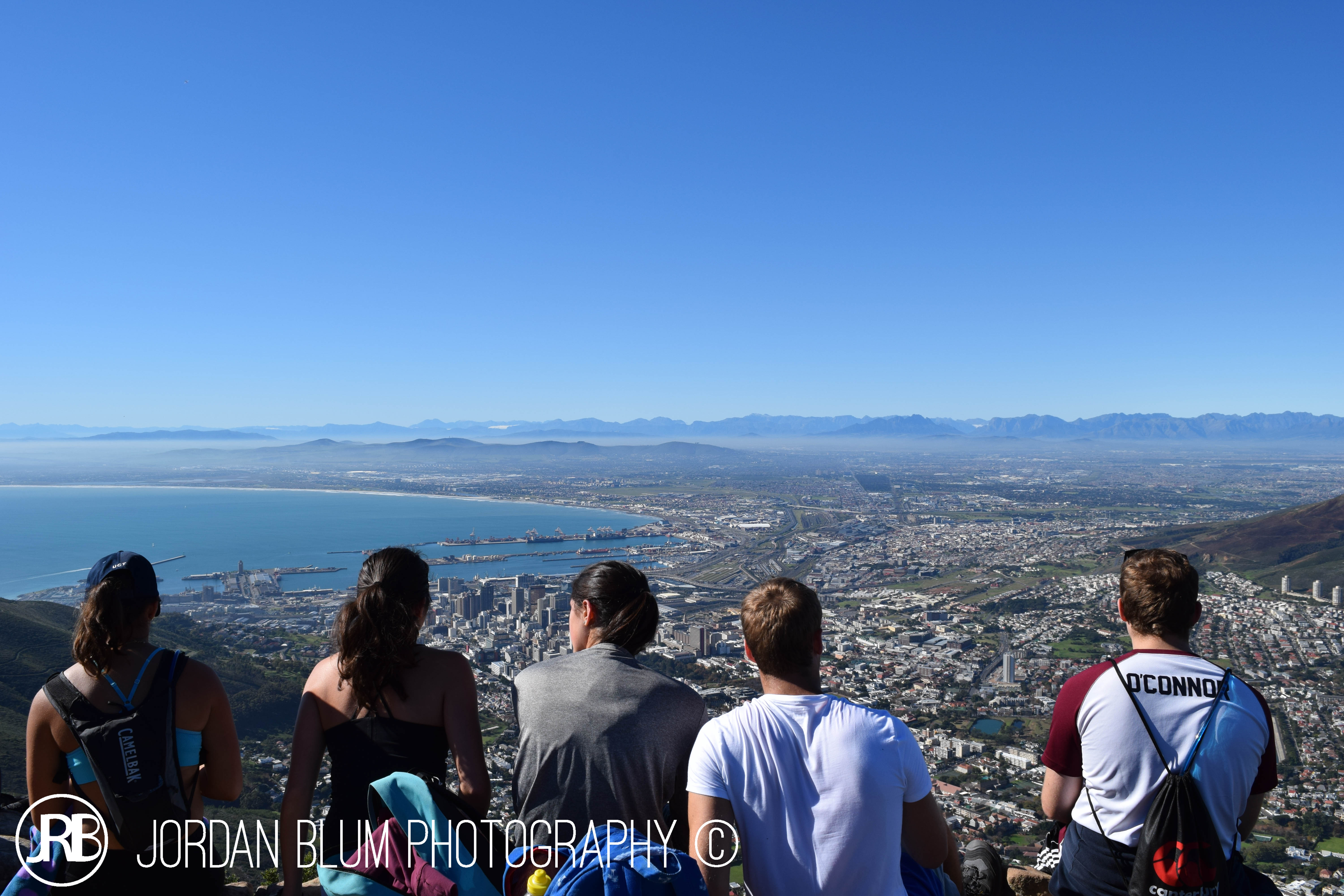 Hikers overlooking Cape Town from Table Mountain